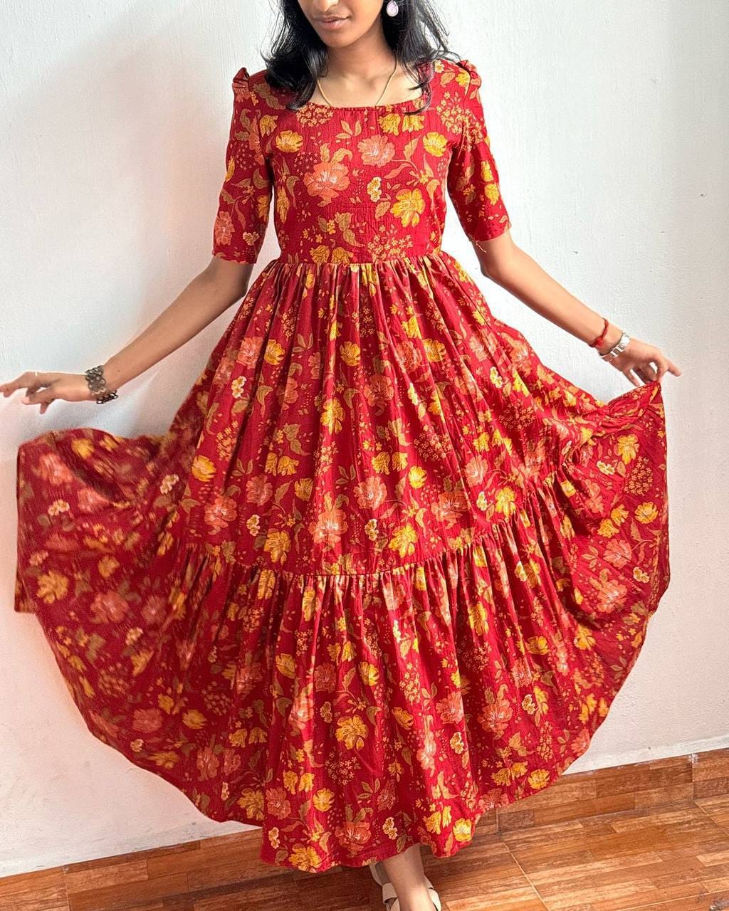Red Floral Dress - Model twirling lifestyle shot