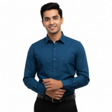 Man Wearing Grey Armour Teal Blue Shirt - Lifestyle