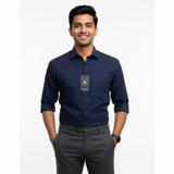Man Wearing Grey Armour Navy Blue Shirt - Lifestyle
